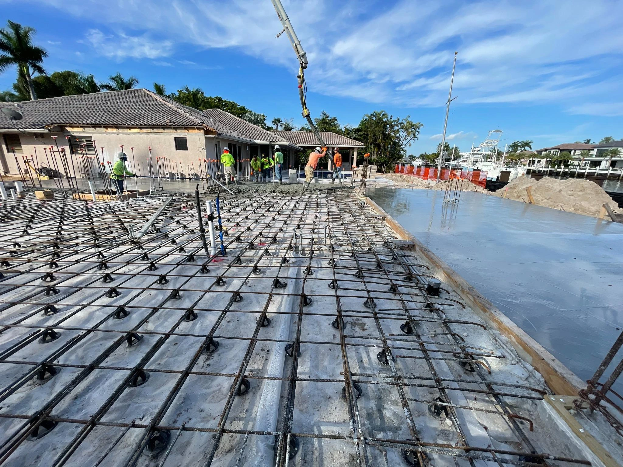 Concrete pumping service in progress for residential build in Broward County